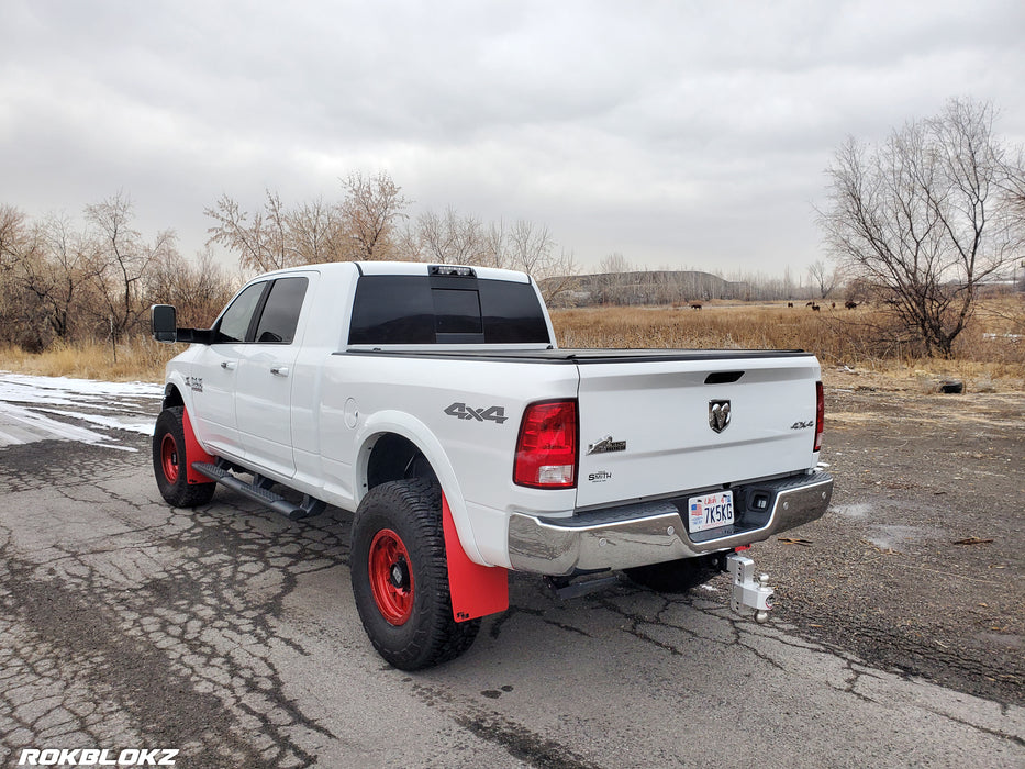 Ram 2500 Featuring XL Mud Flaps in Red