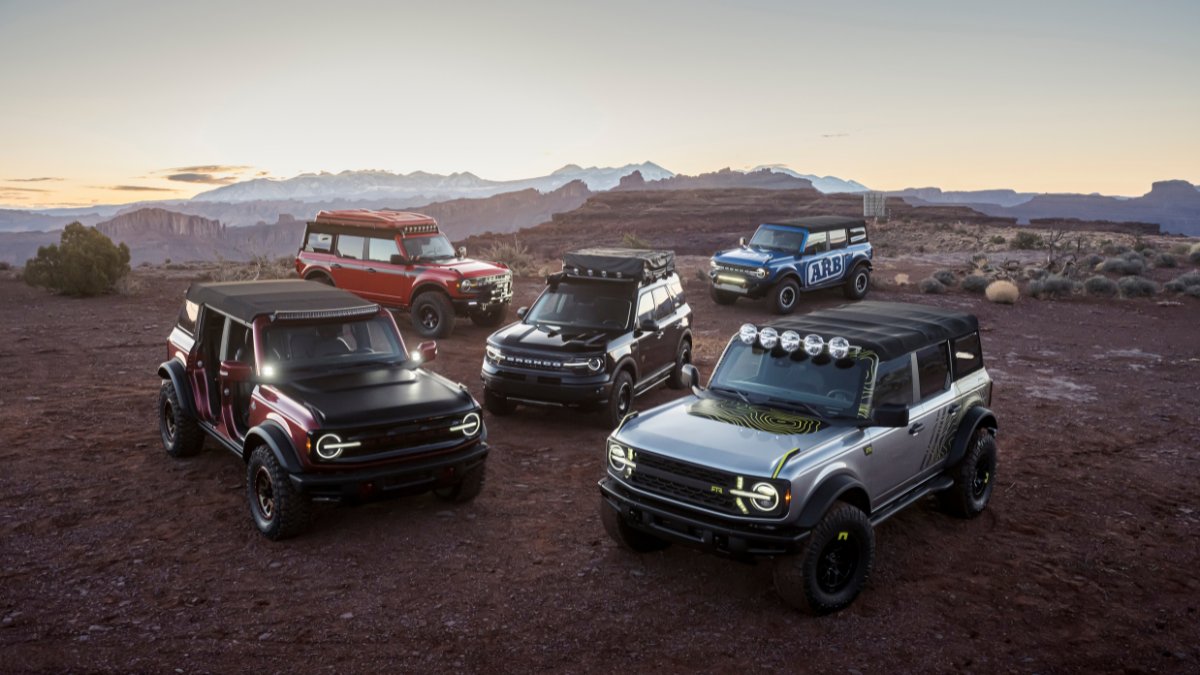 Five different models of Ford 6G Bronco's at Moab, UT photo shoot