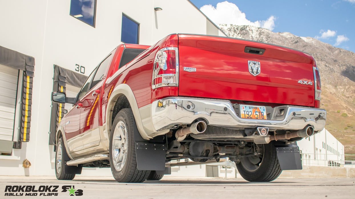 2009 (4th Gen) Ram 1500 Featuring Rokblokz Step Back Mud Flaps - 3/4 view driver side