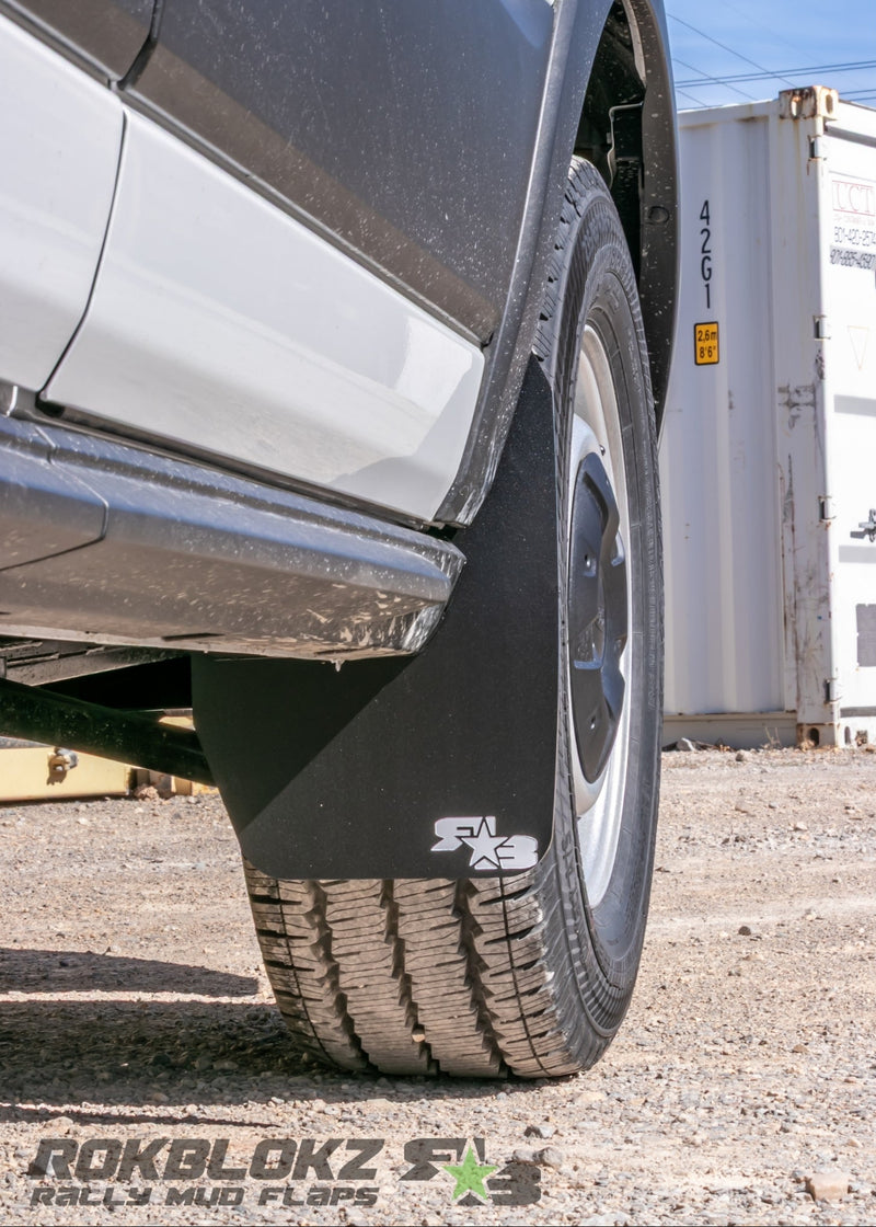 2019 Ford Transit 150 Featuring Rokblokz Mud Flaps - Front flap Up close 