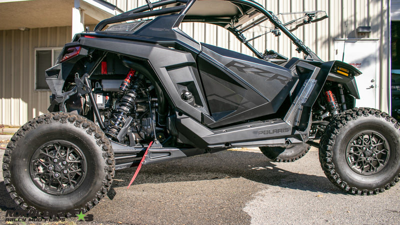 2022 Polaris RZR Pro R FT. Rokblokz Trailing Arm Replacment Flaps for OEM Bracket - whole machine view