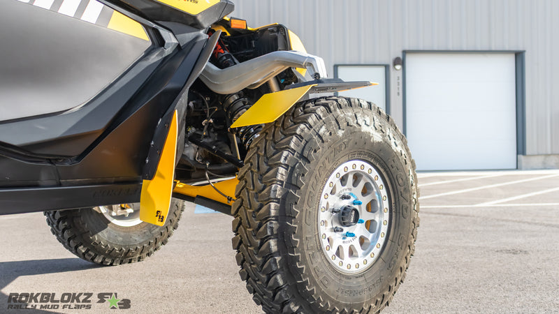 Side angle of Rokblokz knuckle-mounted fender showing coverage on Maverick R