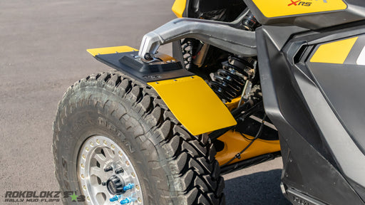 Rokblokz knuckle-mounted fender on 2024 Can-Am Maverick R reducing front tire spray