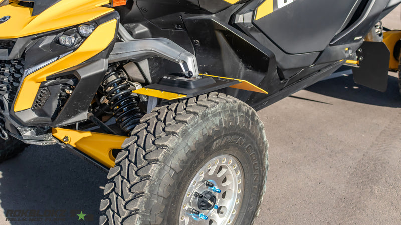 Rokblokz knuckle-mounted fender installed on 2024 Can-Am Maverick R front suspension