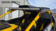 Rokblokz Light Bar brackets installed on the Maverick R cage with a light bar and mirrors mounted