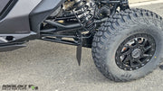 2025 CanAm Maverick R Featuring Rokblokz Upgraded Trailing Arm Mud Flaps for OEM Bracket - side view