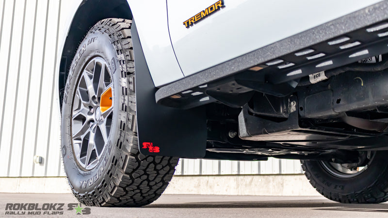 Front mud flaps on 2025 Ford Expedition close up with Rokblokz Logo detail