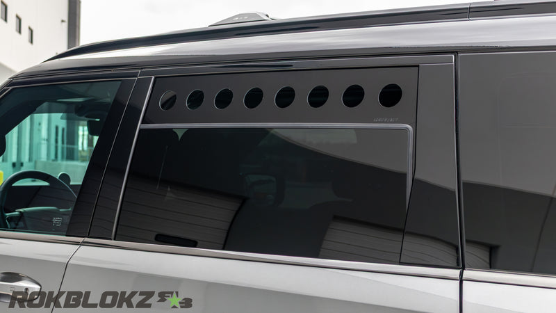 Nissan Armada window partially open with Rokblokz window vent installed