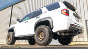 Side view of a 2025 Toyota 4Runner with Rokblokz rally-style mud flaps installed on front and rear wheels.