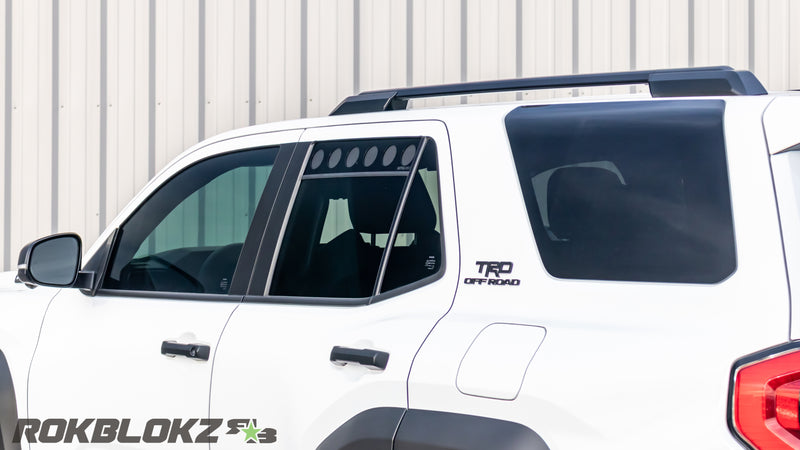 Toyota 4Runner window vents keeping dust and bugs out while camping