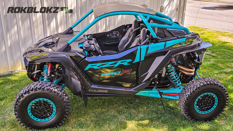 2025 Polaris RZR Pro R Featuring Rokblokz Fender Kit in Black - driver side
