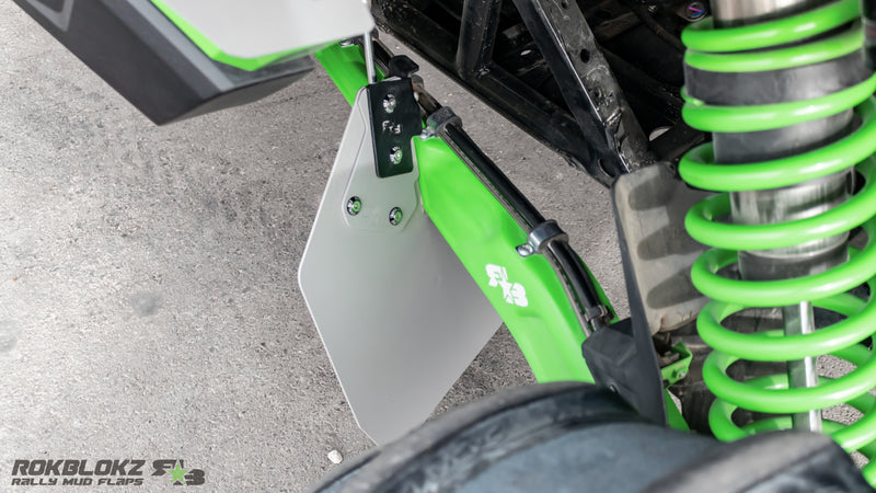 Detail of Rokblokz polymer trailing arm flap mounted on Teryx H2 trailing arm