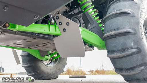 Close up of Rokblokz trailing arm mud flap protecting Kawasaki Teryx H2 suspension from below