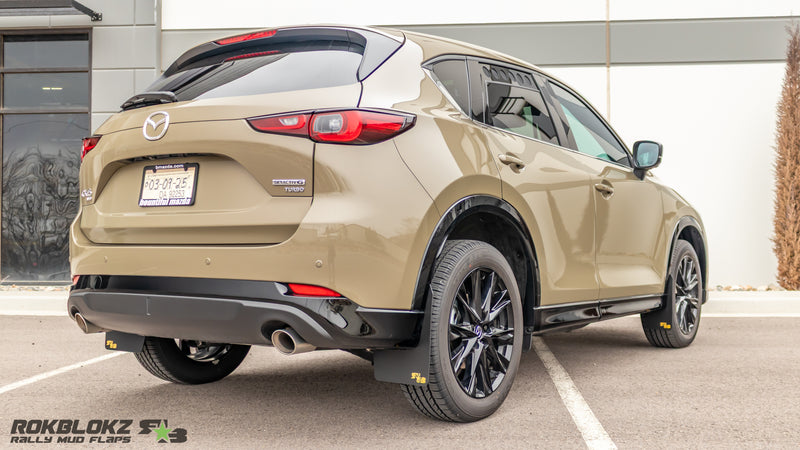 2017-2025 Mazda CX-5 Featuring Rokblokz Rally Mud Flaps with Gold logo - rear 3/4