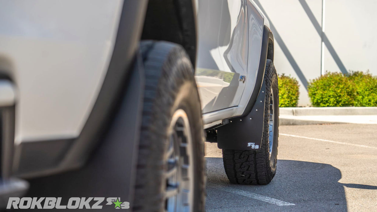 2023+ GMC Canyon AT4 Featuring Rokblokz Mud flaps in black - front.1