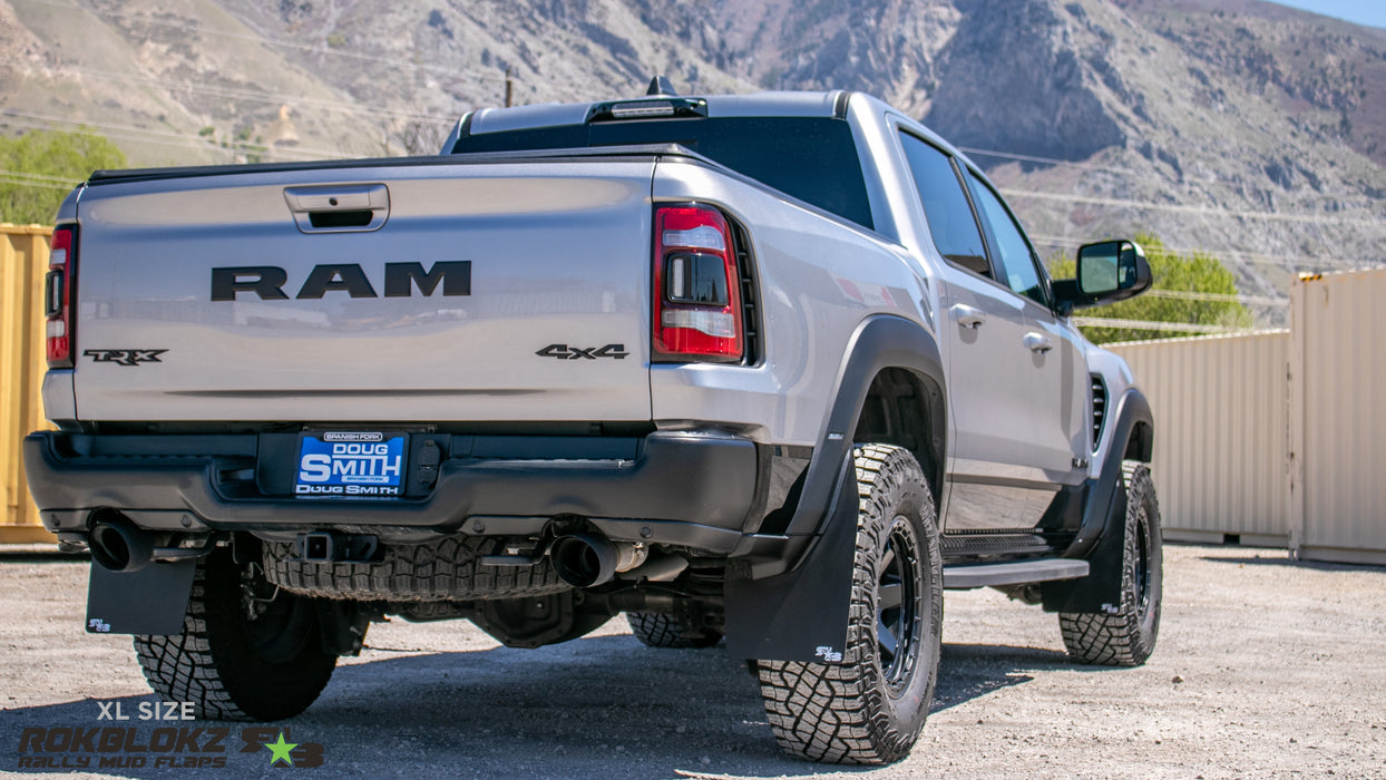 2022+ Ram TRX RHO Featuring Rokblokz mud flaps in XL Size - rear 3/4view