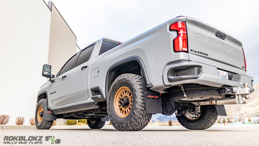 Rokblokz Step-Back Mud Flaps installed on 2020+ Chevy Silverado 2500HD for extra tire clearance and paint protection