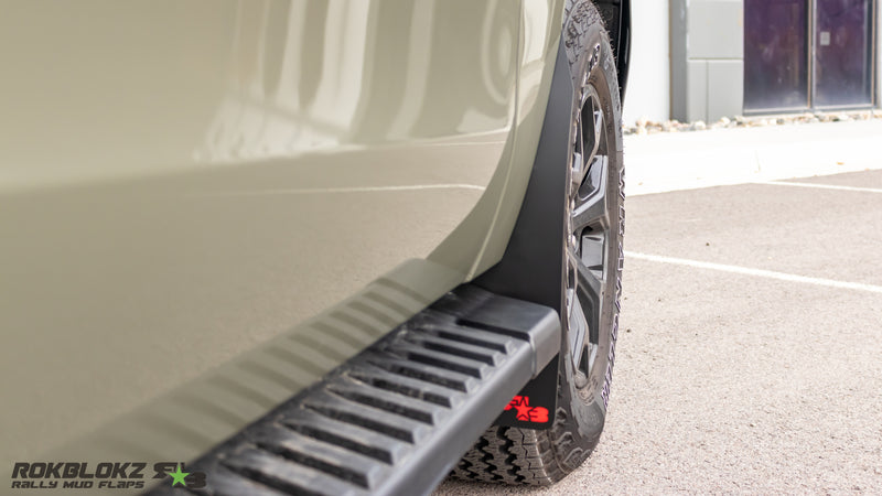 2024 Ford Expedition Timberline featuring Rokblokz Rally Mud Flaps in black - Front flap with side step