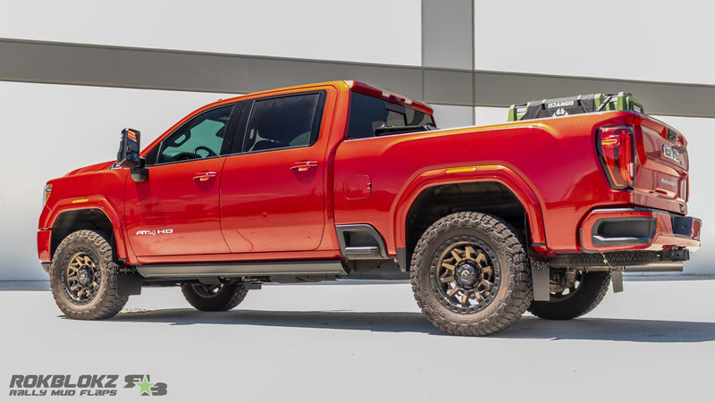 Rokblokz Step-Back Mud Flaps installed on 2020+ GMC Sierra 2500/3500HD - side view