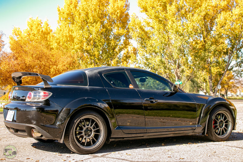 2005 Mazda Rx8 Featuring Rokblokz Splash Guards in Black - rear passenger view