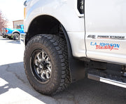 2019 Ford F350 Featuring Rokblokz Rally Style Mud Flaps up close view of front flap