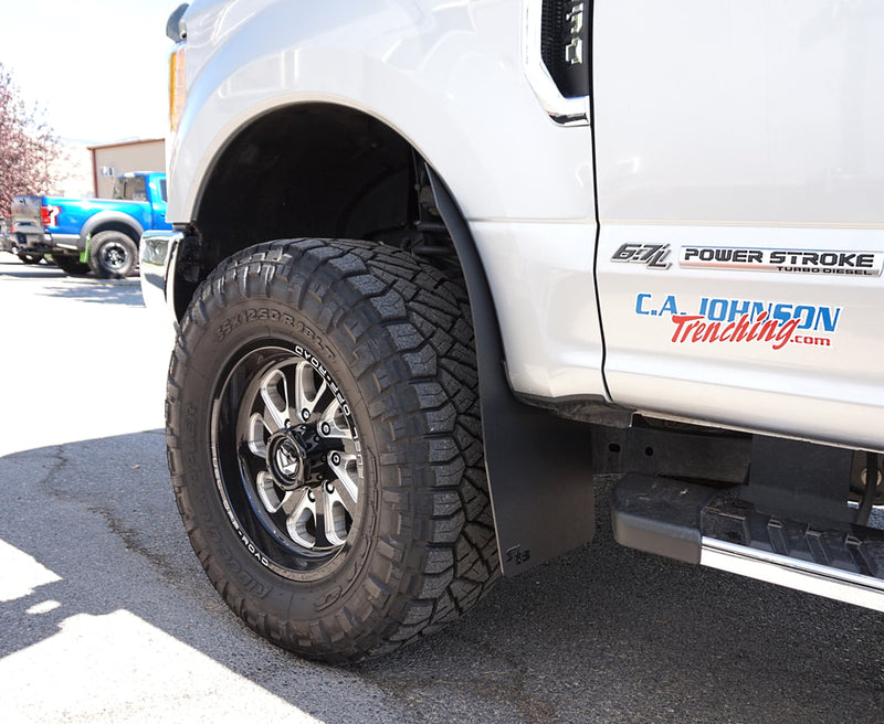 2019 Ford F350 Featuring Rokblokz Rally Style Mud Flaps up close view of front flap