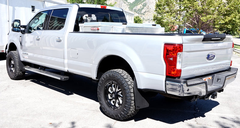 2019 Ford F350 Featuring Rokblokz Rally Style Mud Flaps driver rear corner