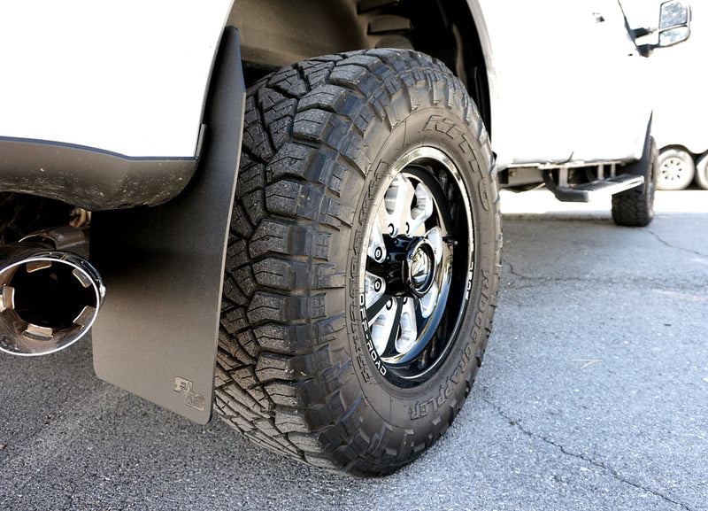 2019 Ford F350 Featuring Rokblokz Rally Style Mud Flaps up close view of rear flap