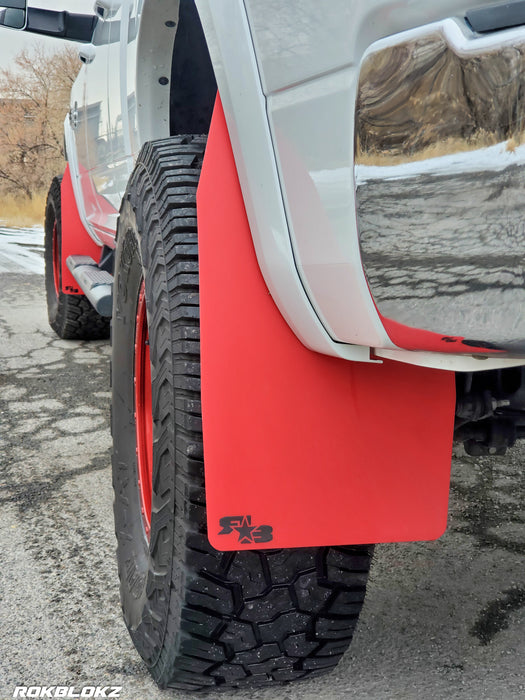 Ram 2500 Featuring XL Mud Flaps in Red