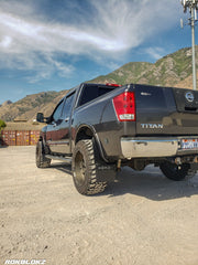 Nissan Titan Featuring Rokblokz Step-Back Mud Flaps in Black - Works with fender tool box
